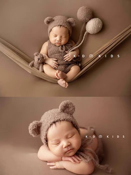 Fotografija rekvizituoja naujagimius, kūdikius ir kūdikius, fotografuoja, drabužius, balionus, pilnaties kepures, megztas antklodes ir vyniojamąjį audinį